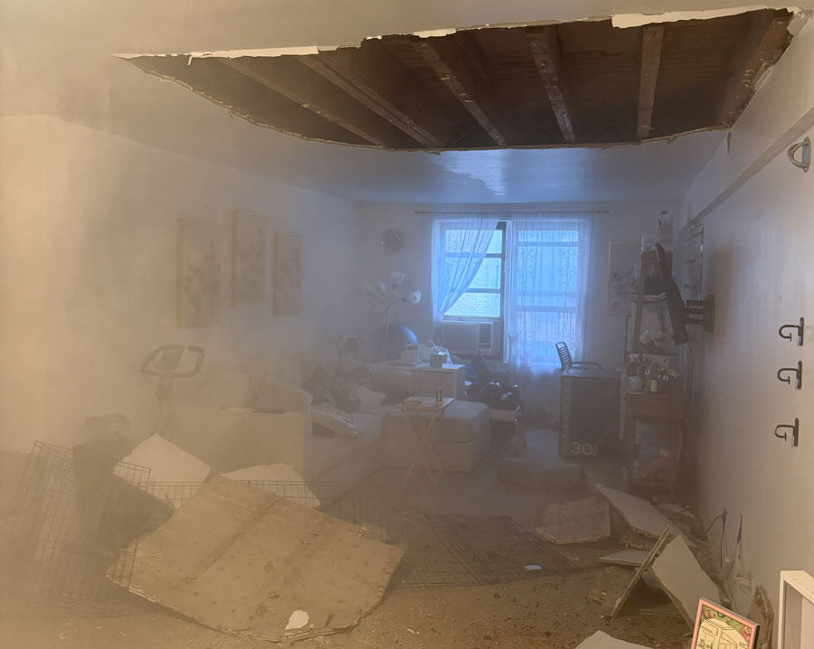 Residential ceiling collapse with widespread dust contamination requiring HEPA cleaning and air purification services
